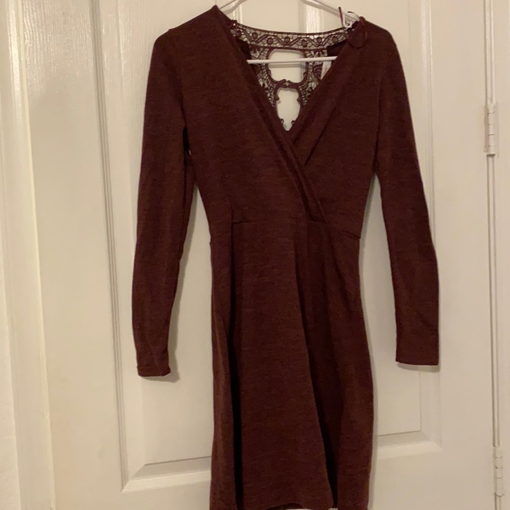 Never worn sweater dress with beautiful lace back detail.
